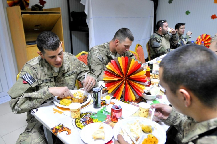 Long Knife carves Thanksgiving turkey
